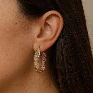 Goldtone twist white acrylic hoops pierced 1.5” diameter